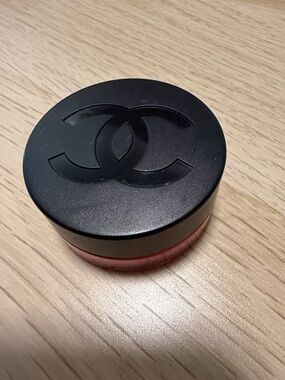 CHANEL Black-Top Cosmetic Pot with Red Base